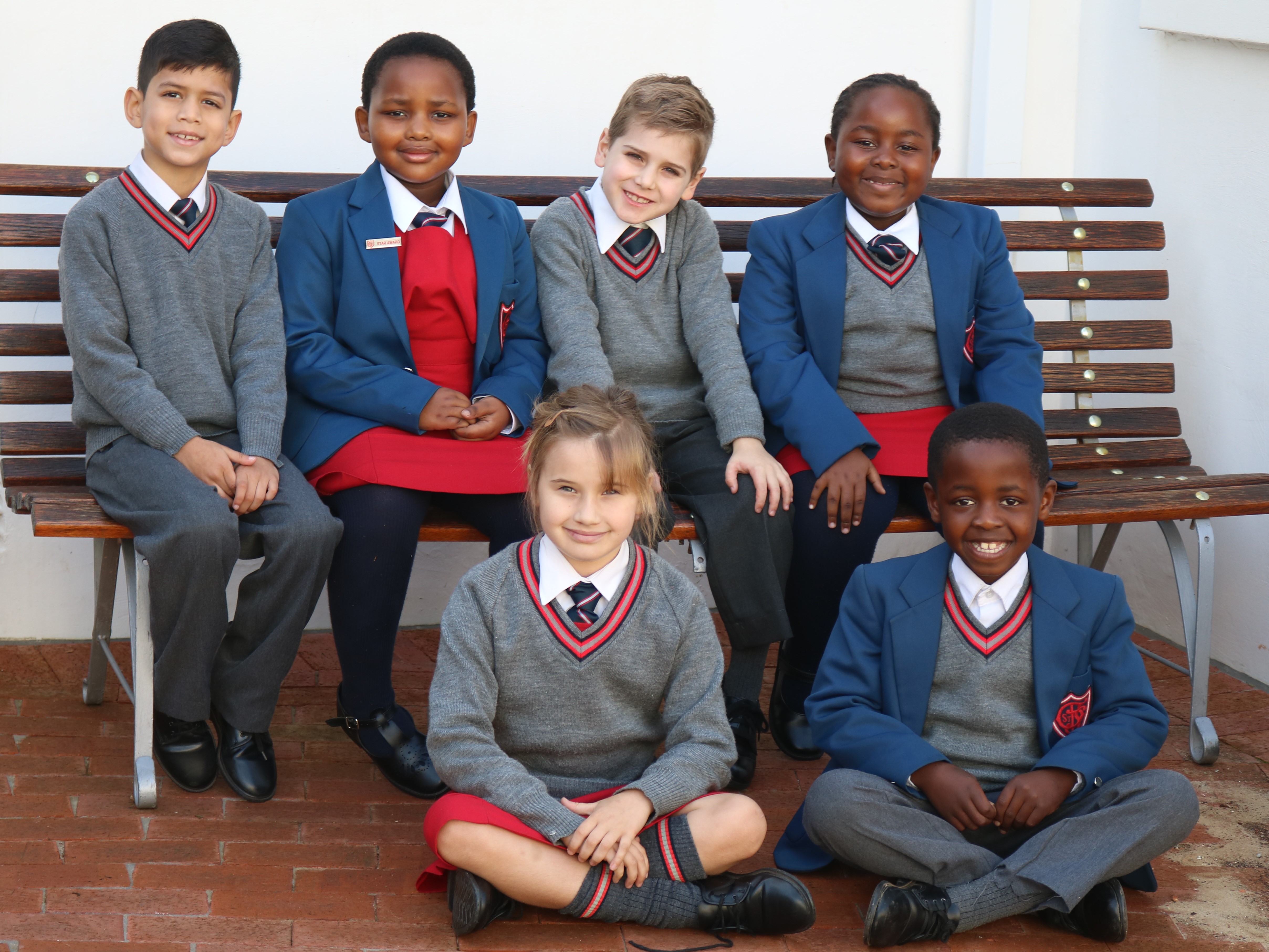 St George's Prep | Happy children | School children | Children on bench
