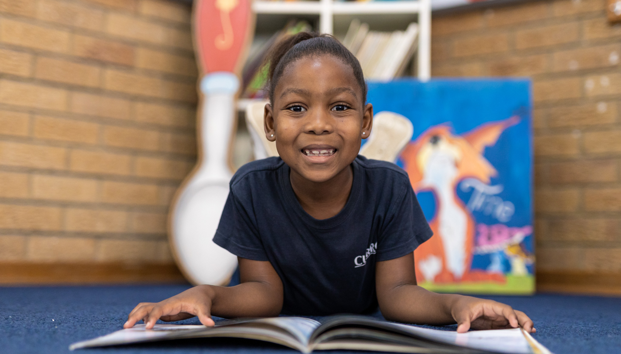Curro Klerksdorp preschool, happy girl, reading